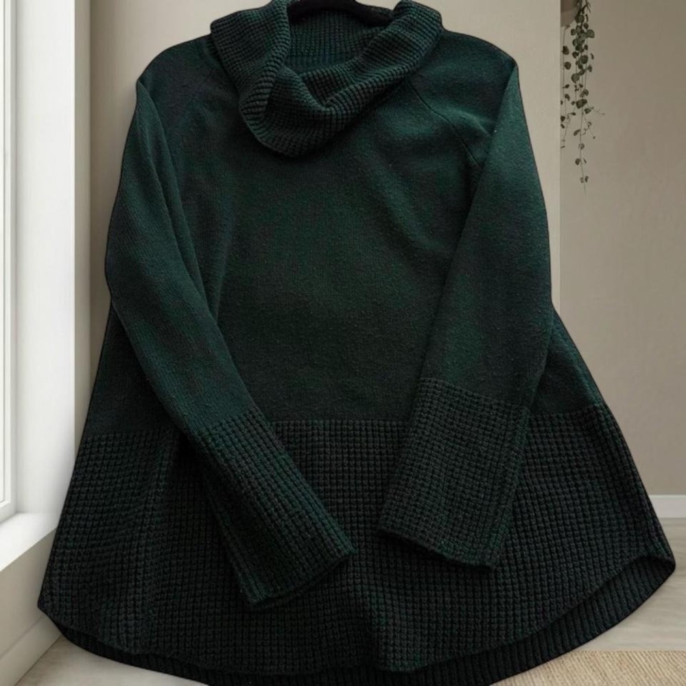 Calvin Klein Green turtleneck sweater with a relaxed fit